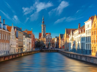 Spiegelrei canal and Jan Van Eyck Square in the morning in Bruges, Belgium