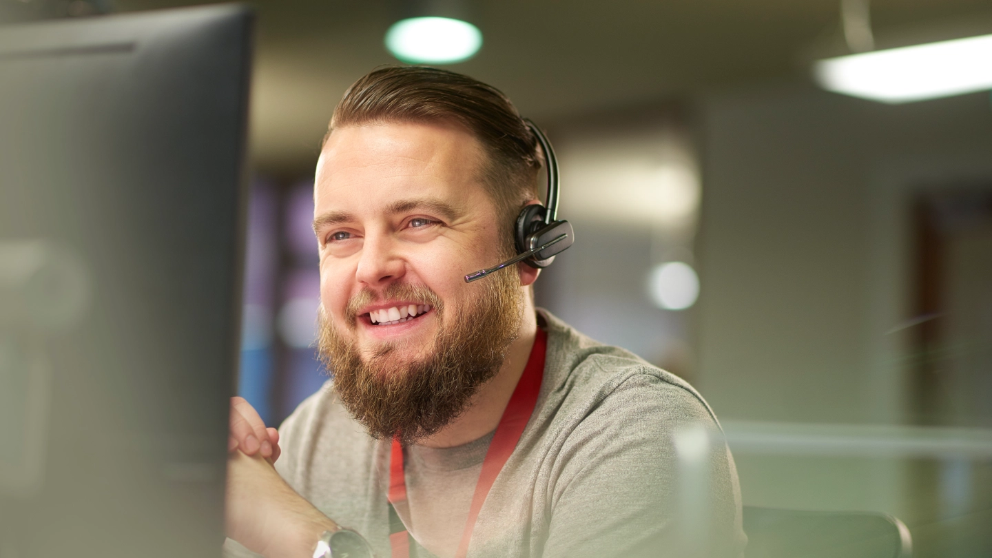 Male IT worker calling a client