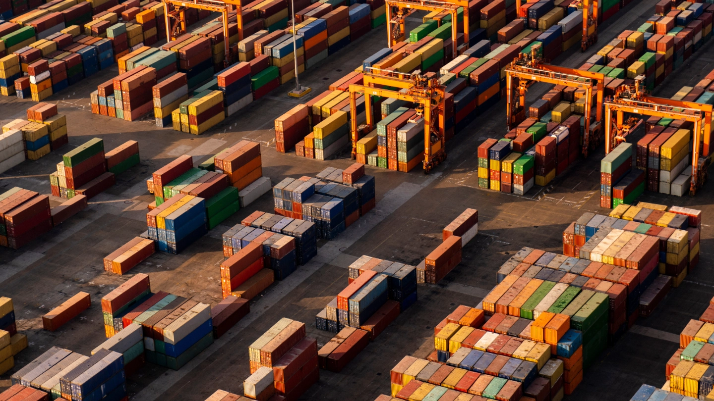 Aerial view of shipping containers in docks Aerial view of shipping containers in docks